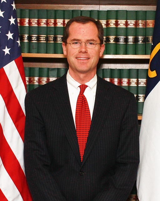 Commissioner Christopher C. Loutit